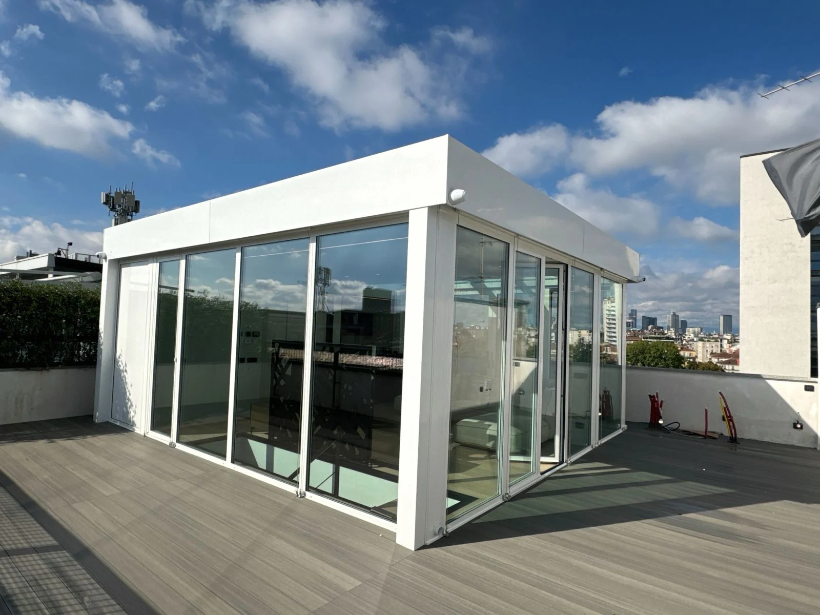 Penthouse: terrazza e volume vetrato